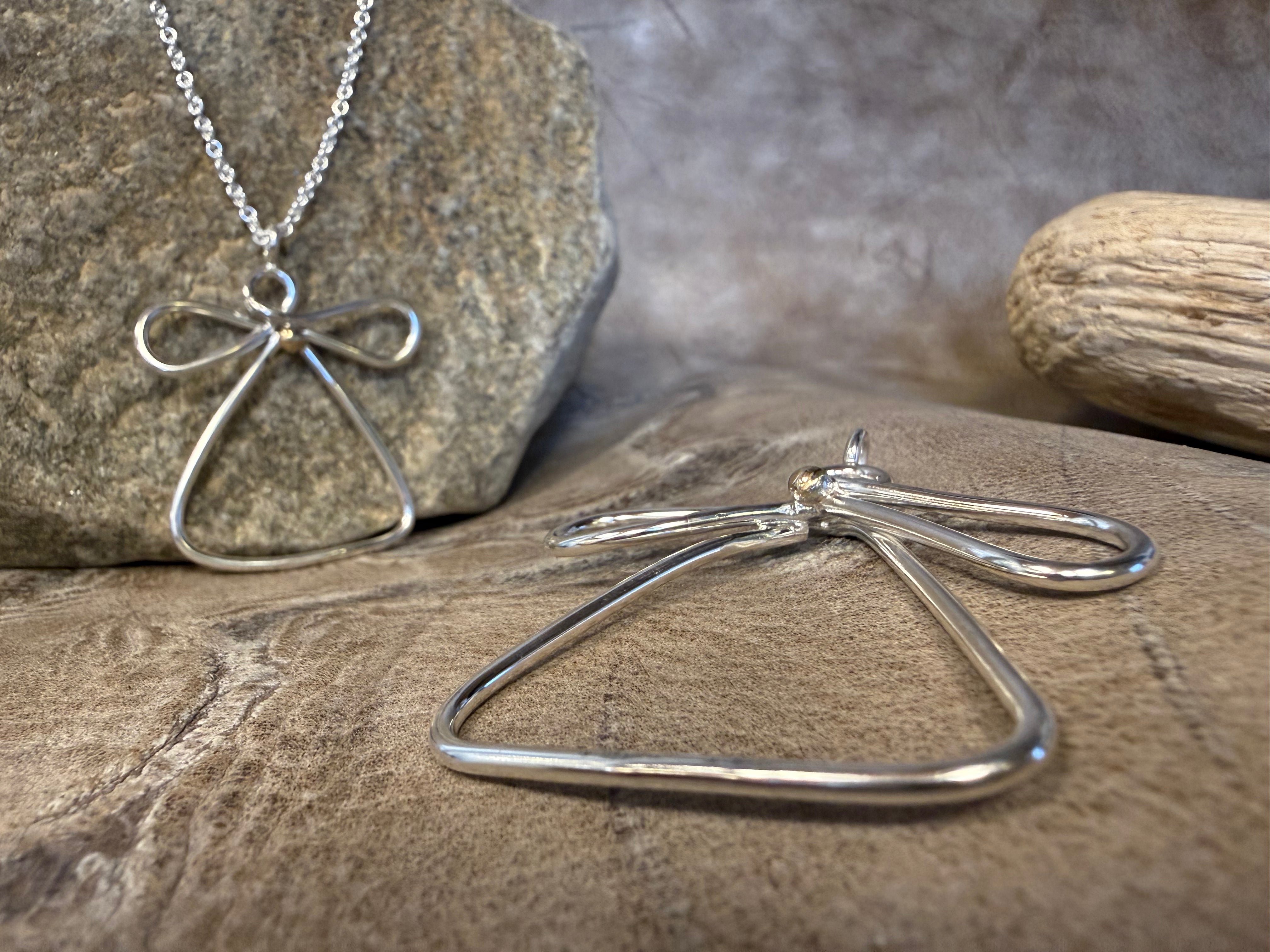 Vesterhavs engel stor sølv med et hjerte af guld