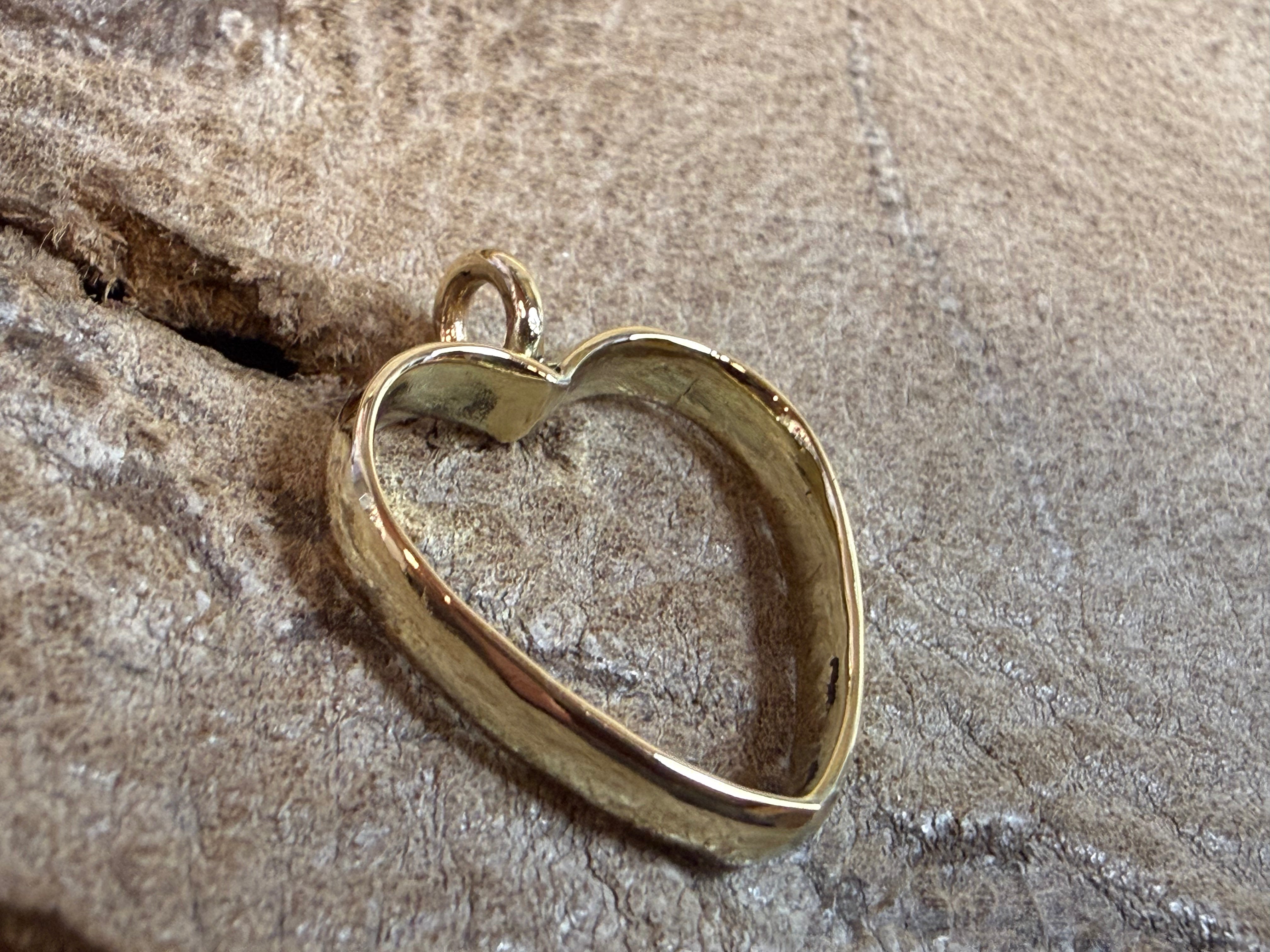 Hjerte vedhæng af vielsesring i 8 kt guld